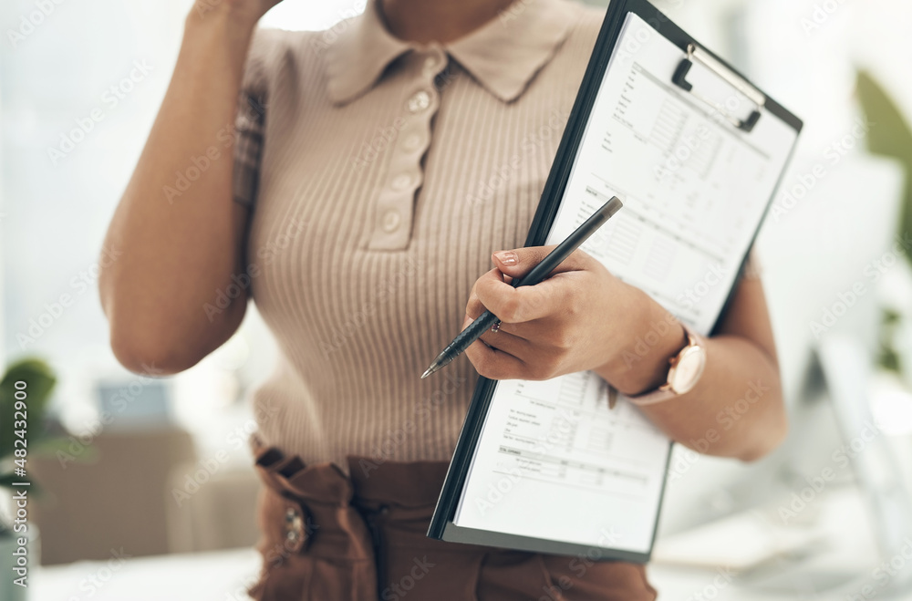 Poster Sorting out some data and info. Closeup shot of an unrecognisable businesswoman holding a clipboard and pen in an office.