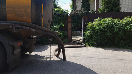 Image of the nodes of the pumping machine for pumping out the septic tank. Sewerage in a private house. pumping waste from the sewer. - obrazy, fototapety, plakaty