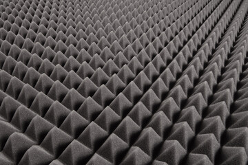 Studio sound proof foam pattern texture. Dark gray  triangular acoustic foam rubber. Background of...