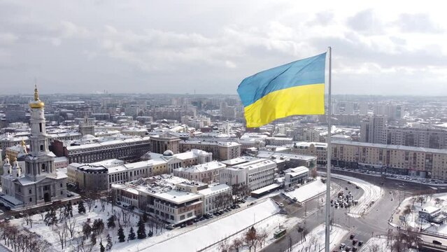 Ukrainian flag in the wind. Blue Yellow flag in the city of Kharkov	
