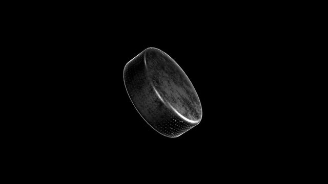 Hockey puck on transparent background. Realistic hockey attribute rotation. Alpha channel.