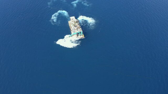 Aerial view, flight over plastic garbage, garbage - disposal. Waste transportation with an excavator, South Male Atoll Maldives, Asia