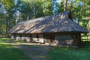 Fototapeta na wymiar Estonian open air museum with cultural and architectural heritage. Summer time. Taliin, Estonia.