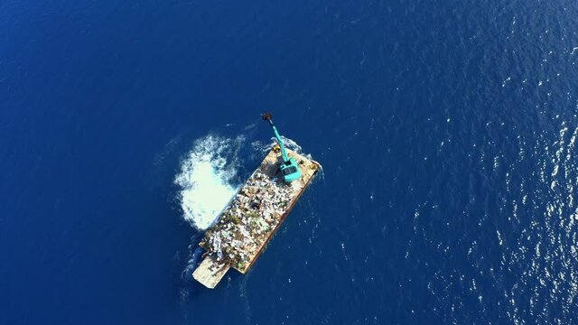 Aerial view, flight over plastic garbage, garbage - disposal. Waste transportation with an excavator, South Male Atoll Maldives, Asia