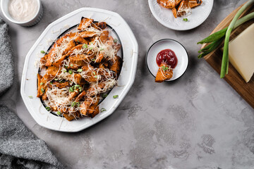 Sweet potatoes batat on grey background