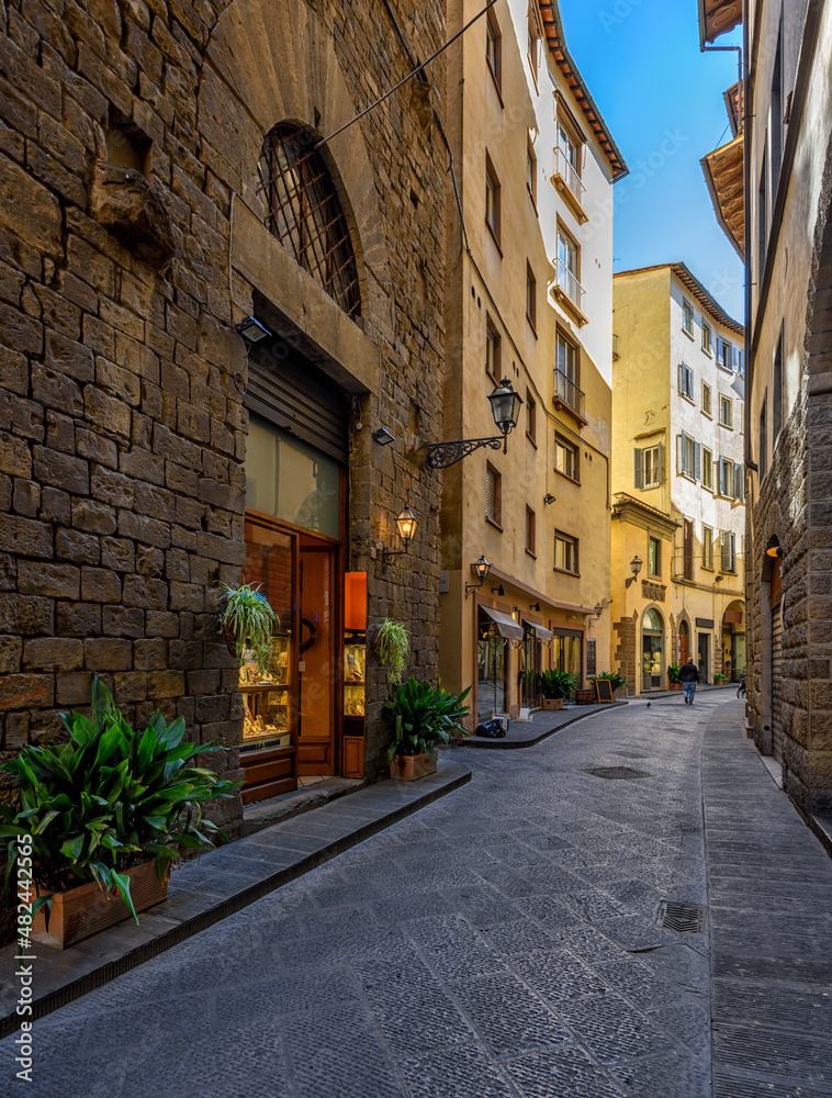 Wall mural narrow cozy street in florence, tuscany, italy. architecture and landmark of florence. cozy florence