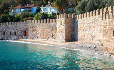 Tersane Beach and wall of fortress, Alanya, Turkey