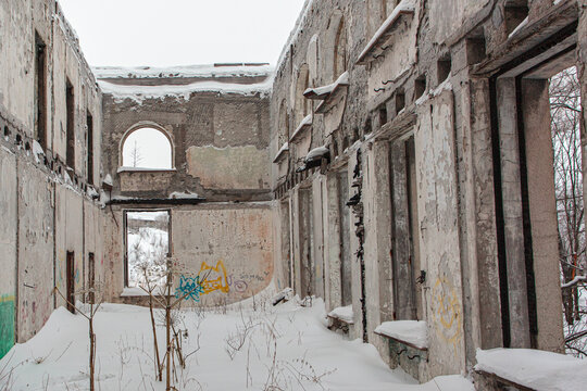 Old railway station at winter with painted walls