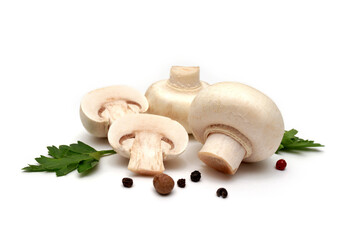 Champignon mushrooms with herbs on white background. Food concept.