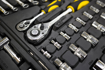 Close-up of  box with tools . Set of the professional tools. Closeup of chrome wrench tools...