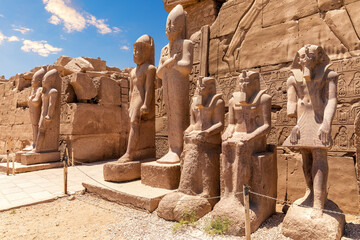 Tuthmosis III statues in front of Karnak's Temple 7th pylon, Luxor, Egypt - obrazy, fototapety, plakaty