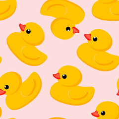 Seamless cute pattern. Yellow rubber duck on a delicate pink background. Fashion textiles and decorative fabrics. 