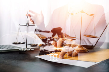 Business and lawyers discussing contract papers with brass scale on desk in office. Law, legal services, advice, justice and law concept picture with film grain effect