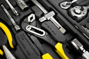 Fototapeta premium Set of the professional tools. Closeup of chrome wrench tools organized in box. .Soft focus .