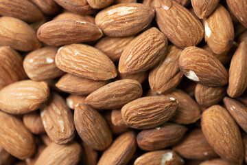 Macro shooting of dry Almond Nuts.Vegetarian food rich in minerals and vitamins. Selective focus