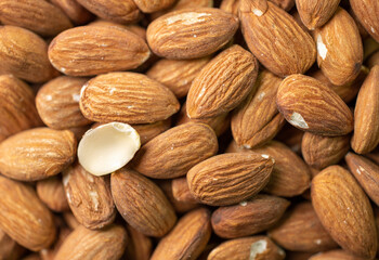 Macro shooting of dry Almond Nuts.Vegetarian food rich in minerals and vitamins. Selective focus