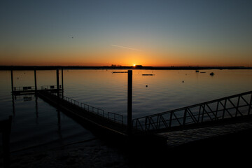 Fototapeta na wymiar Sunset over the River Crouch at Burnham-on-Crouch, Essex