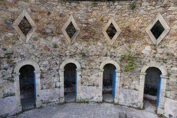 old stone bath buildings ruins in the pyrénées, france