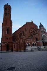 red brick church  on plaza in france