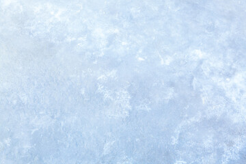 Fototapeta na wymiar Ice texture. Textured ice surface. An abstract background image. Tinted.