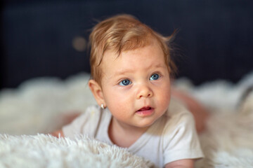 Beautiful  baby girl with   blue eyes.crawling baby.child smiling.
