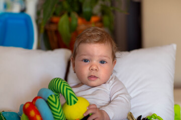 Cute little girl  is playing with baby toy.Little toddler