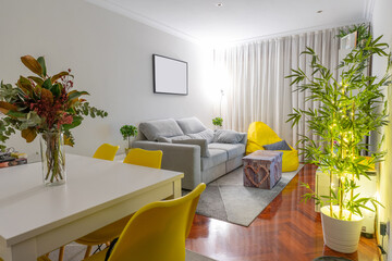 Living room interior with an empty frame