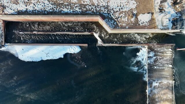 water flowing through fish ladder at water diversion dam - Watson Lake Dam on the Poudre River in northern Colorado, aerial view of winter scenery