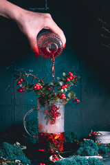 Bottle full of berries fresh ripe northern lingonberry . The concept of healthy food and organic products. 