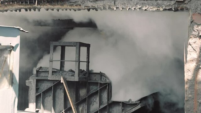 Cooling of coke oven coal after the coking process close up. Coke oven coal production. Metallurgical enterprise