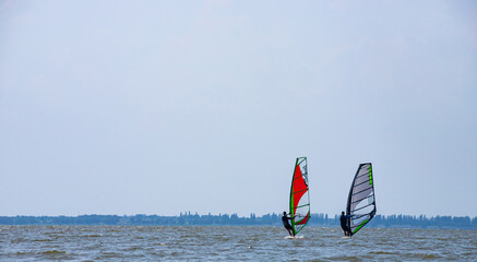 Windsurfing. Entertainment at sea, extreme sports, lifestyle during the summer holidays