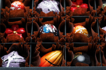 Assorted handmade sweet chocolates in a box