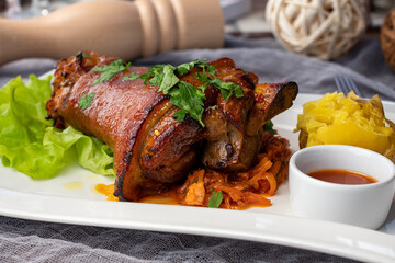 Pork knuckle fried on a white plate