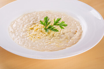 Cheese Risotto Italian Cuisine.. Made with rice arboreo and Grana Padano cheese