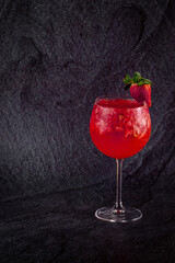 Gin cocktail with strawberry. Tropical drink