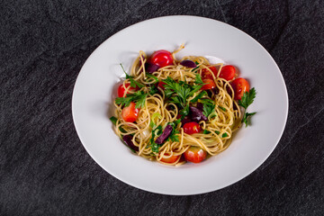 .Spaghetti puttanesca.  spaghetti with black olives and cherry tomatoes