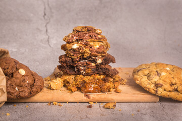stuffed cookies with melted chocolate and caramel, selective focu