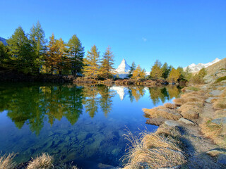 The Grindjisee is a mountain lake above Zermatt in Switzerland. When there is no wind, the...