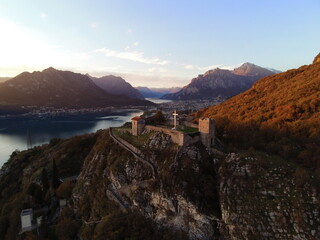 Fototapeta na wymiar View of the Castello dell' Innominato. Vercurago, Italy. Lecco lake. Italian mountain. Pink hour 