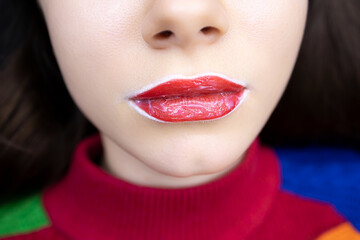 permanent lip tattoo procedure close-up of prepared lips with anesthesia applied to them before the...