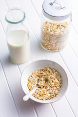 Breakfast cereals. Uncooked oatmeal. Raw oat flakes.