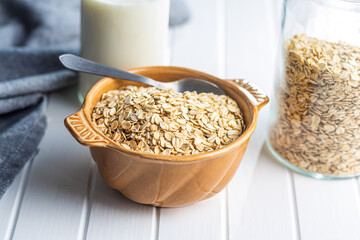 Breakfast cereals. Uncooked oatmeal. Raw oat flakes.