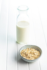 Uncooked oatmeal. Raw oat flakes.