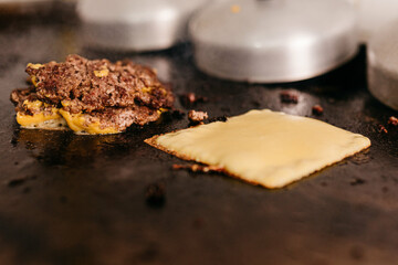 Snack - hamburger and cheese frying for smash burger