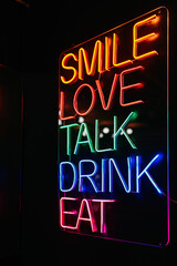 Neon sign with actions verb
