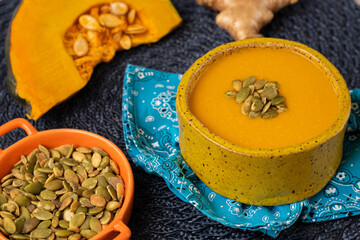 Soup - Pumpkin broth with roasted pumpkin seed snack