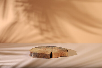 Abstract background with natural wooden podiums and long shadows on a pastel wall, an empty...
