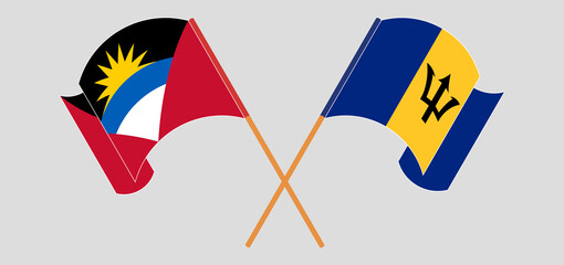 Crossed and waving flags of Antigua and Barbuda and Barbados