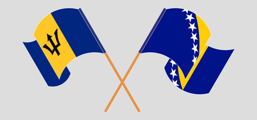 Crossed and waving flags of Barbados and Bosnia and Herzegovina