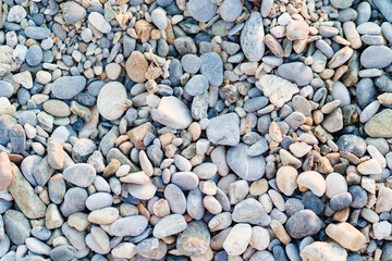 gray pebbles. pebble beach. stones for landscape design. background.